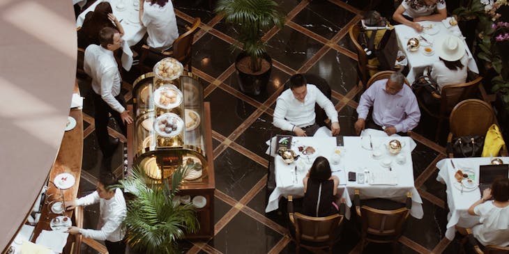 Aerial shot of diners eating at a supper club.