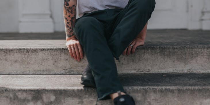 Man with one tattooed arm.