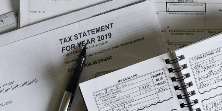Income tax documents and notepad