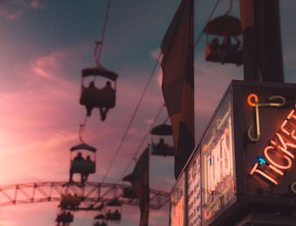 Front view of a ticket stand sign.