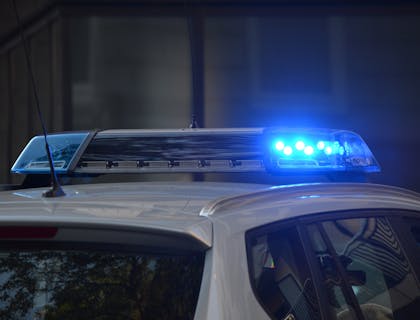 A police car during a traffic ticketing stop.