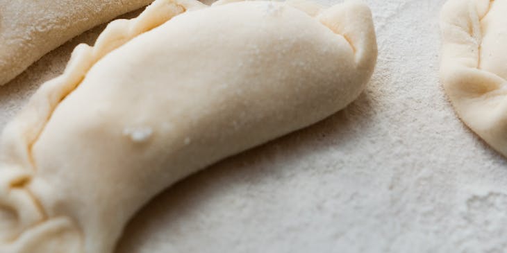 Ukrainian food being made at a Ukrainian restaurant.