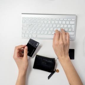 Use a bill payment service to make payments with your credit card.