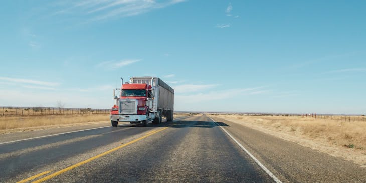Vehicle shipping transport truck on the highway.
