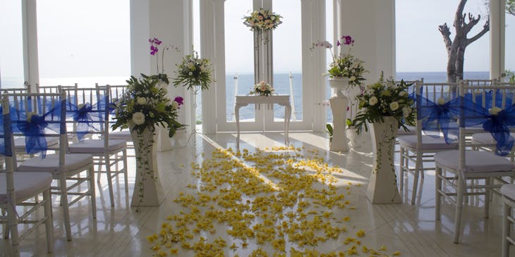 A wedding venue set up and ready for a wedding to start.