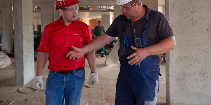 Professionals in their workwear.