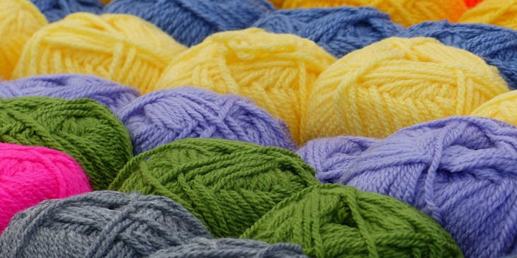 Colorful balls of yarn in a yarn business.