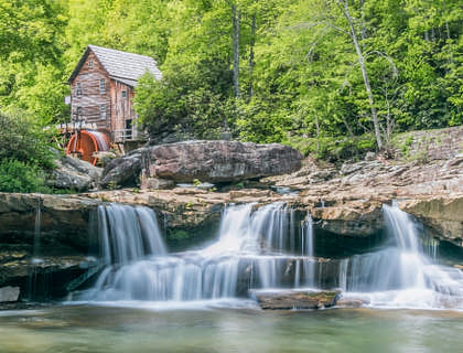 A photo of cabin with watermill in Babcock State Park, West Virginia