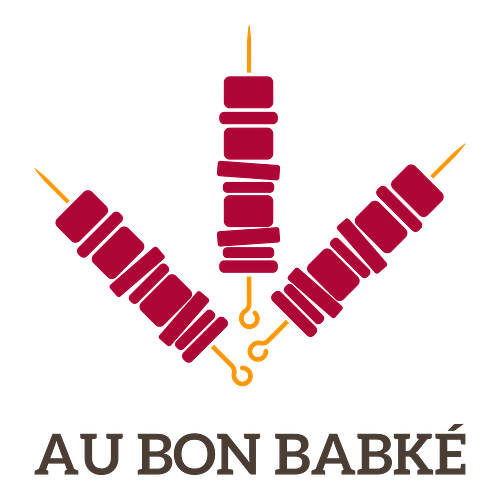 Un logo de restaurant de  fast-food pour une entreprise appelée Au Bon Babké.